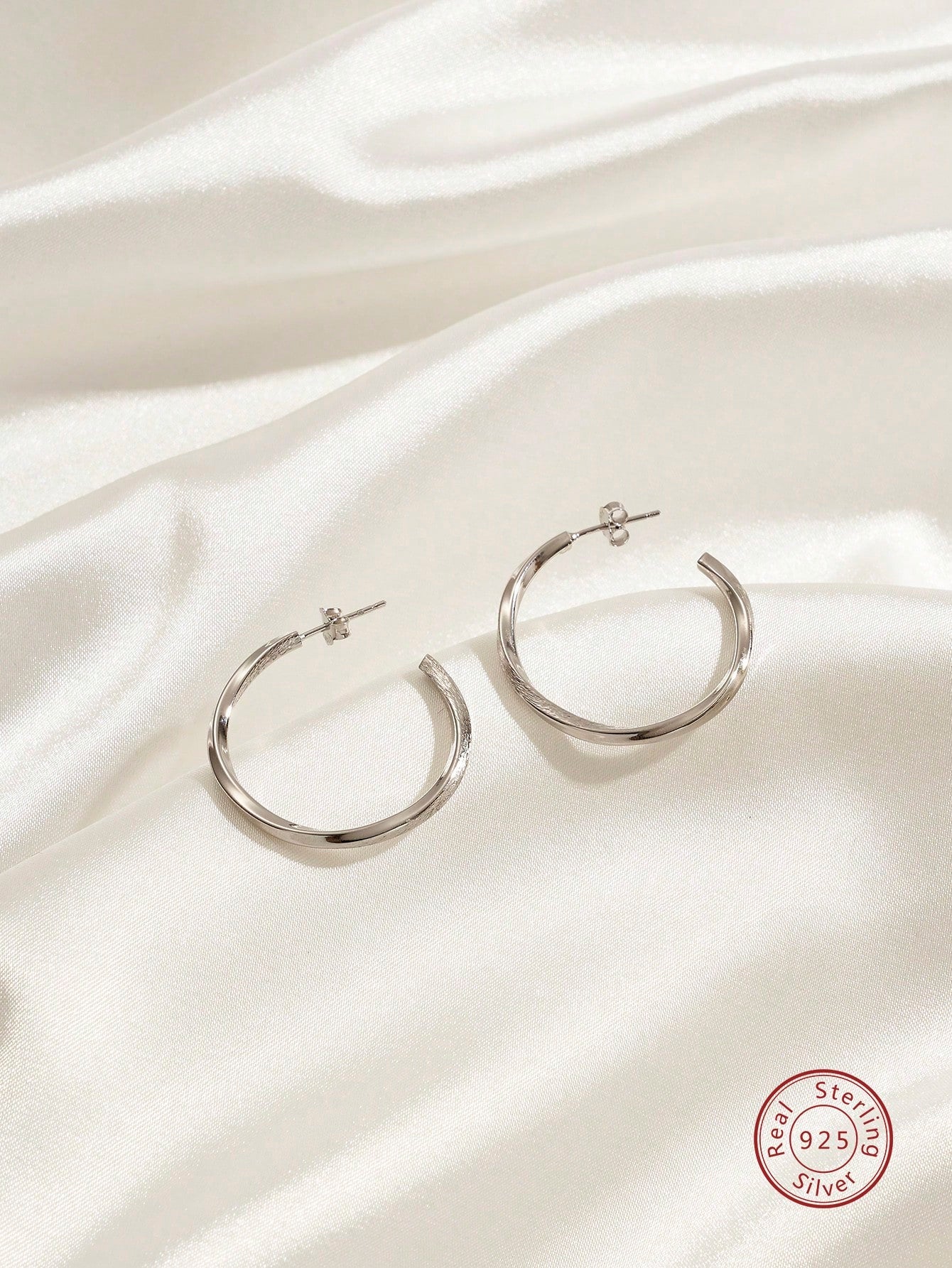 Twist Silver Hoop Earrings